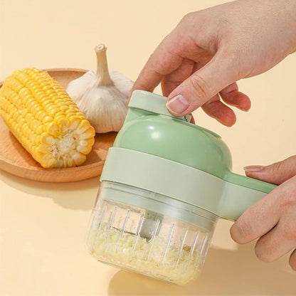 Coupe légumes électrique avec un eplucheur qui fait office de poussoir