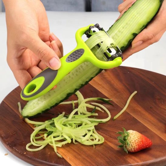Econome lame double fonction épluchage classique et julienne de légumes