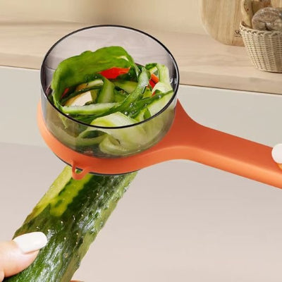 Éplucheur à légumes récipient integré permettant de collecter les épluchures