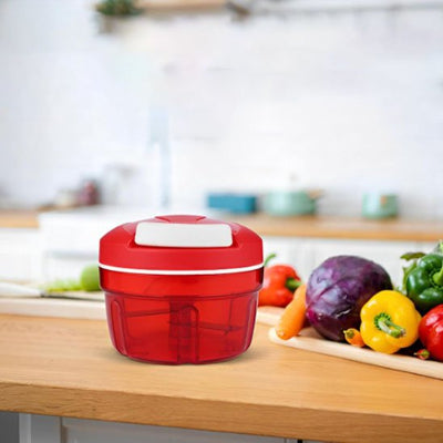Hachoir avec lames rotatives intégrées pour hacher finement légumes, herbes et aromates