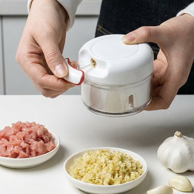 Mini hachoir sans danger lames protégées à l'intérieur du bol évitant tout contact direct