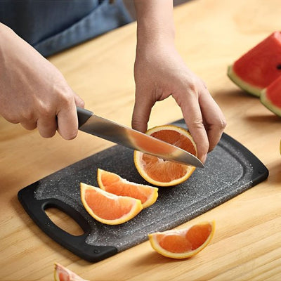 Planche a decouper surface antidérapante texturée pour stabliliser aliments pendant la découpe