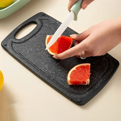 Planche a decouper surface dure qui préserve le tranchant des lames